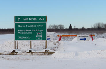 A distance sign along the Fort Chipewyan ice road.